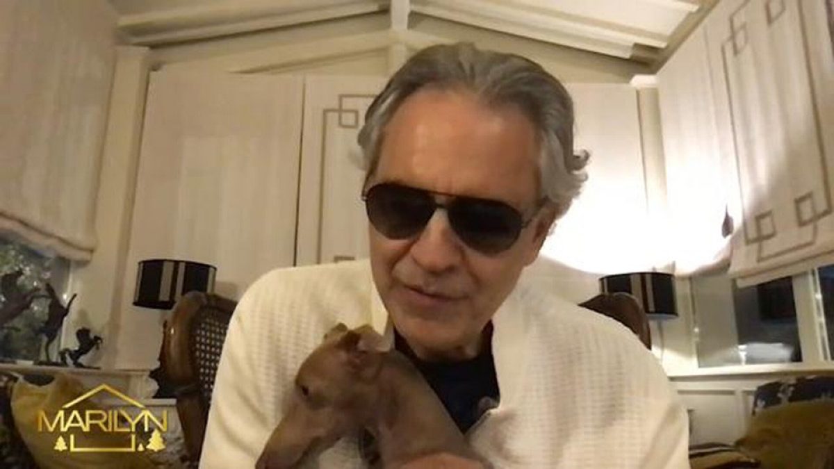 Andrea Bocelli cuddles adorable pup during interview before performing ...